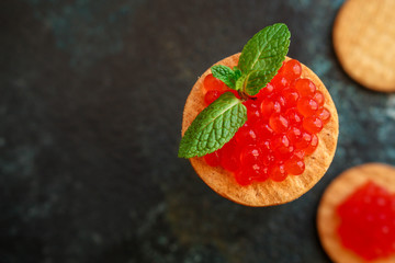 red caviar (seafood, salmon caviar) menu concept. food background. top view. copy space