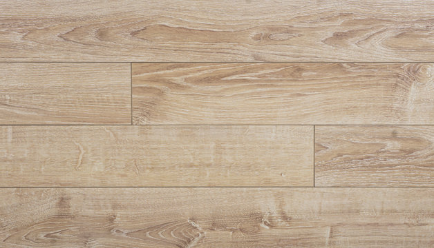 Laminate background. Wooden laminate and parquet boards for the floor in interior design. Texture and pattern of natural wood