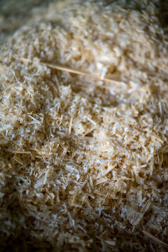 Wood Saw Dust Pile At A Woodworking Workshop.