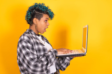 woman or girl with laptop computer isolated on color background