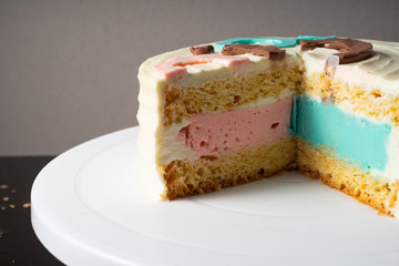 Cake with vanilla biscuit. Mars and Venus? Sectional view. Classic cheesecake. Pink and blue.