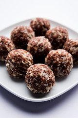 Aliv Laddu, Halim Ladoo or Garden cress Seed sweet Balls a very nutritious food in winters or for New Moms. popular food from India. served in a bowl or plate