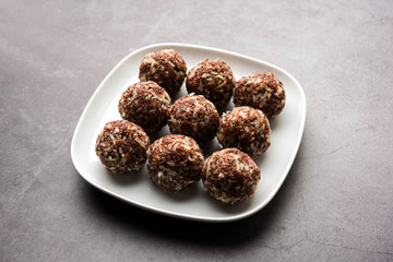 Aliv Laddu, Halim Ladoo or Garden cress Seed sweet Balls a very nutritious food in winters or for New Moms. popular food from India. served in a bowl or plate