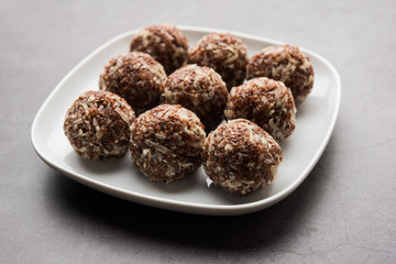 Aliv Laddu, Halim Ladoo or Garden cress Seed sweet Balls a very nutritious food in winters or for New Moms. popular food from India. served in a bowl or plate