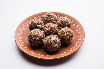 Aliv Laddu, Halim Ladoo or Garden cress Seed sweet Balls a very nutritious food in winters or for New Moms. popular food from India. served in a bowl or plate