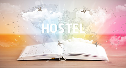 Open book with HOSTEL inscription, vacation concept