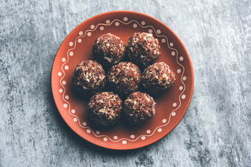 Aliv Laddu, Halim Ladoo or Garden cress Seed sweet Balls a very nutritious food in winters or for New Moms. popular food from India. served in a bowl or plate