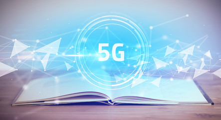 Open book with 5G abbreviation, modern technology concept