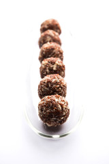 Aliv Laddu, Halim Ladoo or Garden cress Seed sweet Balls a very nutritious food in winters or for New Moms. popular food from India. served in a bowl or plate