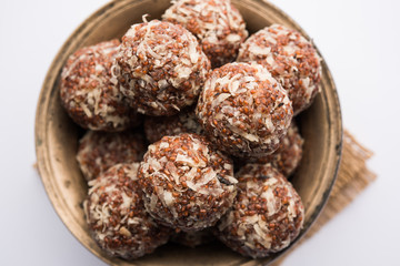 Aliv Laddu, Halim Ladoo or Garden cress Seed sweet Balls a very nutritious food in winters or for New Moms. popular food from India. served in a bowl or plate