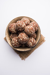 Aliv Laddu, Halim Ladoo or Garden cress Seed sweet Balls a very nutritious food in winters or for New Moms. popular food from India. served in a bowl or plate