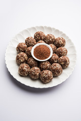 Aliv Laddu, Halim Ladoo or Garden cress Seed sweet Balls a very nutritious food in winters or for New Moms. popular food from India. served in a bowl or plate