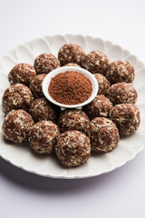 Aliv Laddu, Halim Ladoo or Garden cress Seed sweet Balls a very nutritious food in winters or for New Moms. popular food from India. served in a bowl or plate