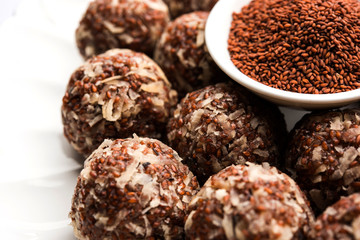 Aliv Laddu, Halim Ladoo or Garden cress Seed sweet Balls a very nutritious food in winters or for New Moms. popular food from India. served in a bowl or plate
