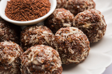 Aliv Laddu, Halim Ladoo or Garden cress Seed sweet Balls a very nutritious food in winters or for New Moms. popular food from India. served in a bowl or plate