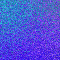 Holographic colors foil paper texture background.