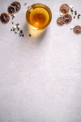 Green tea in glass cup, tonic and antioxidant drink, healthy lifestyle. Lemon flavored beverage