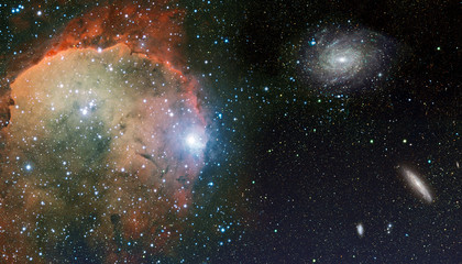 Cosmic landscape with nebula, stardust, spigal galaxy