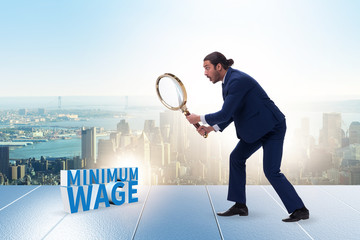 Concept of minimum wage with businessman