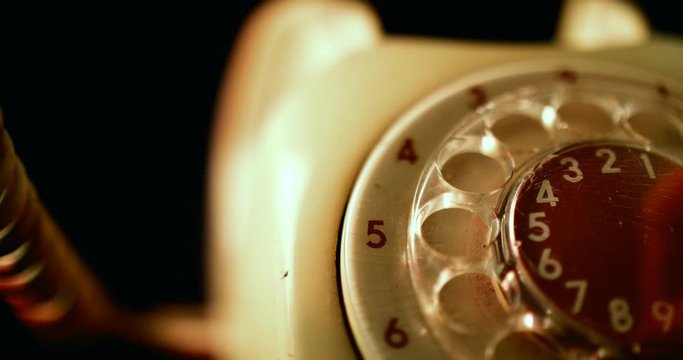 Old telephone with rotary dial