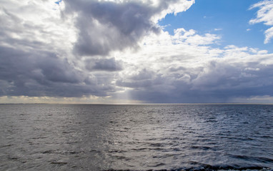 dramatic illuminated coastal scenery in Eastern Frisia