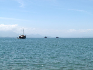 Tour boats on a calm sea