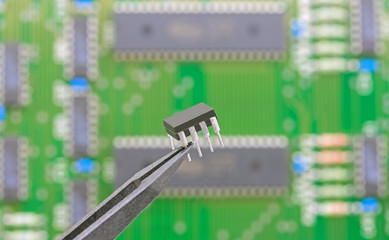 Electronic component held with tweezers