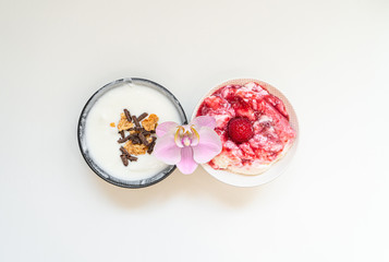 Greek yogurt in bowl with spoons,Healthy breakfast with Fresh greek yogurt, muesli and berries on background