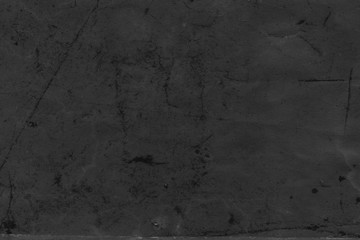 Fototapeta na wymiar Cardboard black abstract texture close-up. Dark old paper background. Grunge concrete wall. Vintage blank wallpaper.