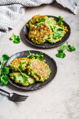 Green broccoli and pea pancakes. Healthy vegan food concept.
