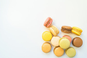 Sweet and colourful french macaroons or macaron on background, Dessert.