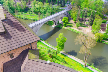 Bridge over Eger river top aerial view from walls of Loket Castle Hrad Loket gothic style building...