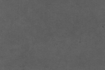 Fototapeta premium Cardboard black abstract texture close-up. Dark old paper background. Grunge concrete wall. Vintage blank wallpaper.