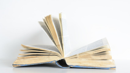 open old book on a white background. Concept - education, read, literature