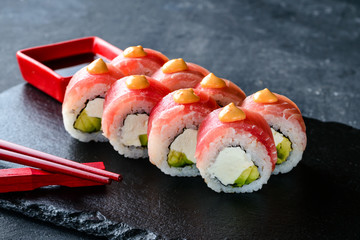 black stone sushi roll close-up restaurant serving