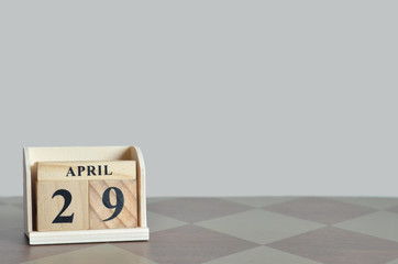 April 29, Empty Background with number cube on the table.	