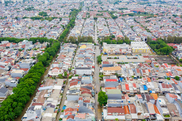 Aerial view of flood hit housing and factory