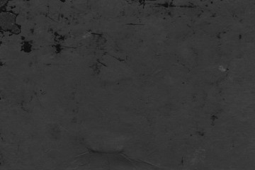 Cardboard black abstract texture close-up. Dark old paper background. Grunge concrete wall. Vintage blank wallpaper.
