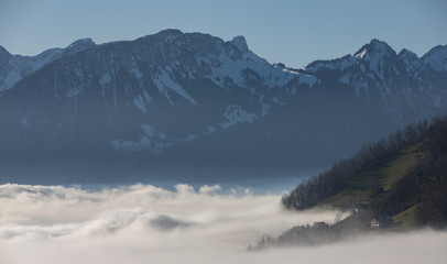 Border of the thermal inversion layer, Amden, Switzerland, Europe