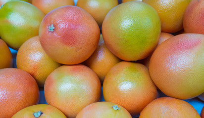 Bunch of grapefruits in the market.