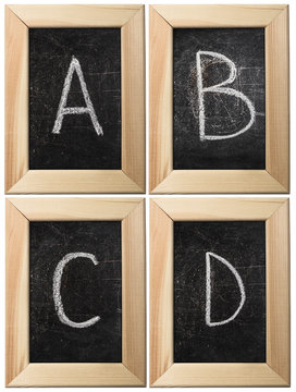 Part of the alphabet drawing with chalk on the old scratched chalkboard background with wooden frame. Letters: A, B, C, D. The remaining letters of this alphabet can be found in my partfolio