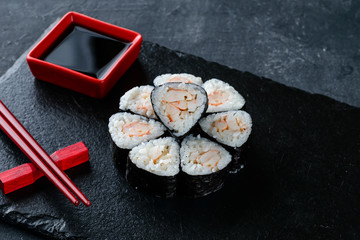 black shale poppy sushi close-up