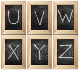 Part of the alphabet drawing with chalk on the old scratched chalkboard background with wooden frame. Letters: U, V, W, X, Y, Z. The other letters of this alphabet can be found in my partfolio
