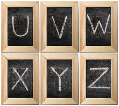 Part of the alphabet drawing with chalk on the old scratched chalkboard background with wooden frame. Letters: U, V, W, X, Y, Z. The other letters of this alphabet can be found in my partfolio