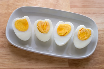 Boiled egg on white dish