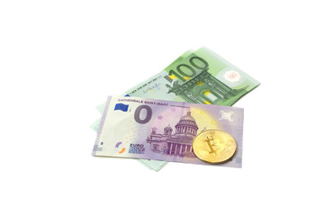 Obraz na płótnie Canvas Coin bitcoin lies with european euro banknotes. Banknotes zero and one hundred euros on an isolated white background. Currency exchange concept.