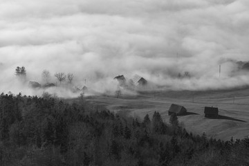 Border of the thermal inversion layer, Amden, Switzerland, Europe