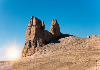 Fototapeta premium skeletons of the walls of the ancient fortresses of Khorezm in the desert. Uzbekistan