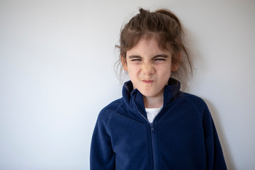 Funny Little Girl Making A Face