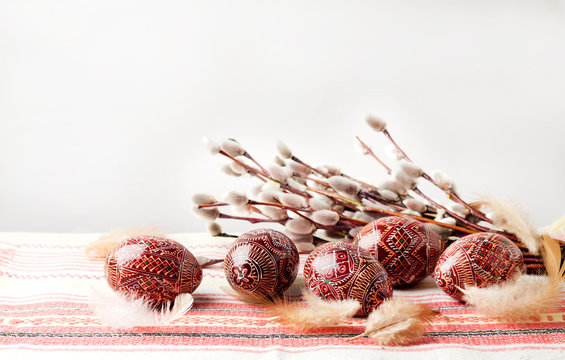 Easter still life with Pysanka on traditional Ukrainian cloth. Decorated Easter eggs, traditional for Eastern Europe culture